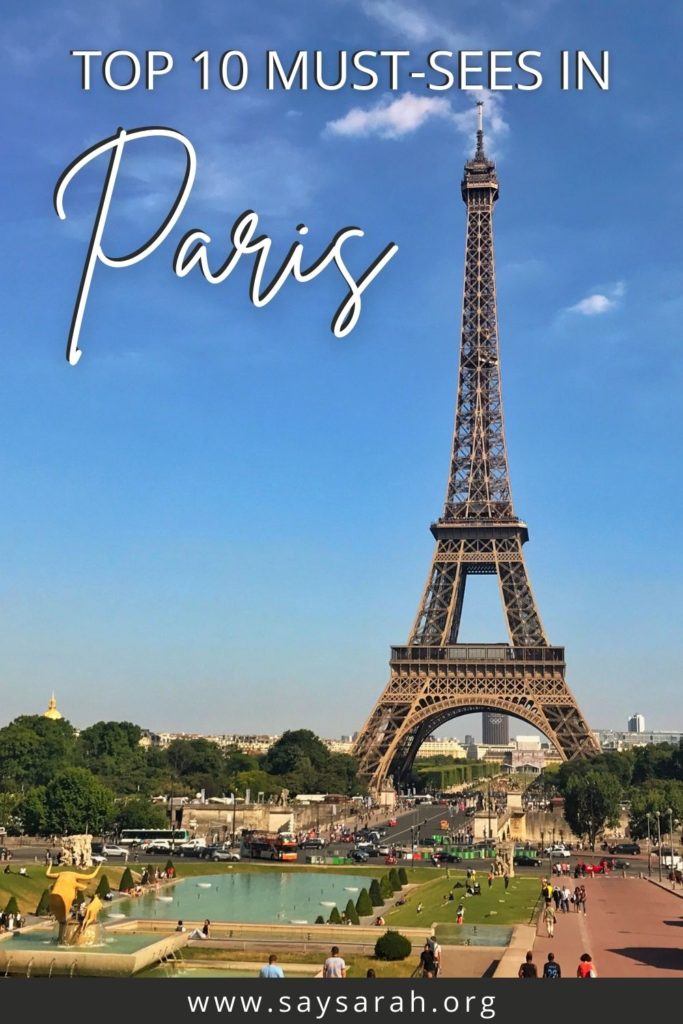 A graphic representing the blog post titled "Top 10 Must Sees in Paris" with a background image of the Eiffel Tower in Paris, France.