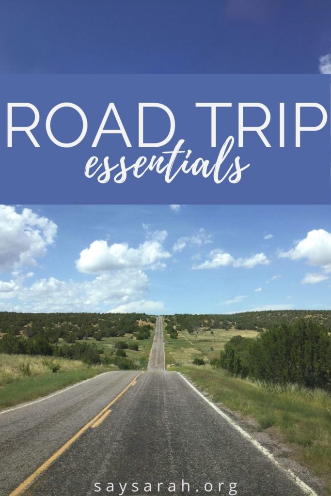 A pin graphic titled "Road Trip Essentials" with a road landscape picture.