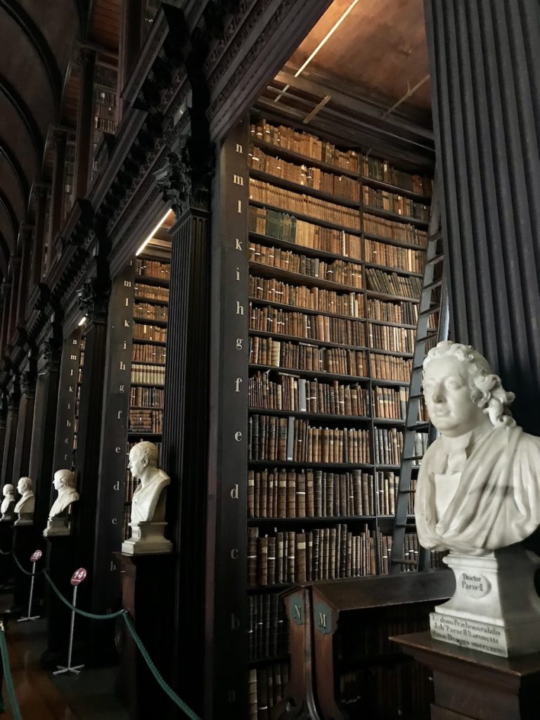 A view of the floor to ceiling book shelfs in Trinity College's library where the Book of Kells is located in Dublin Ireland.