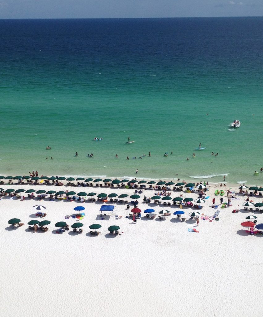 A view of the white sands beaches and turquoise waters from a hotel balcony in Destin, Florida.