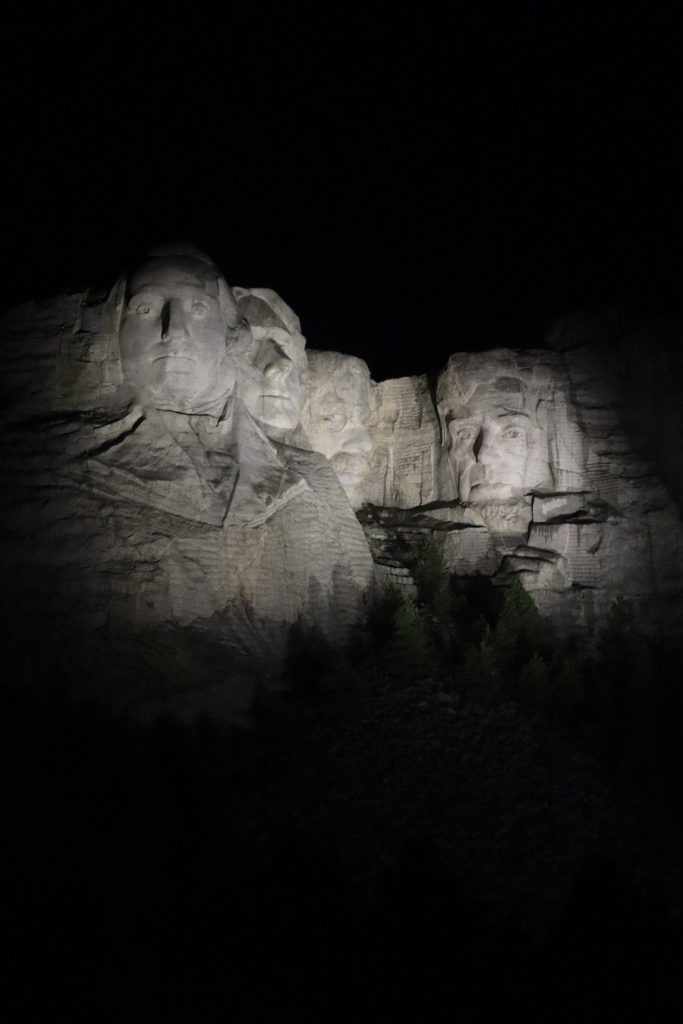 Up close photo of Mount Rushmore in South Dakota at night